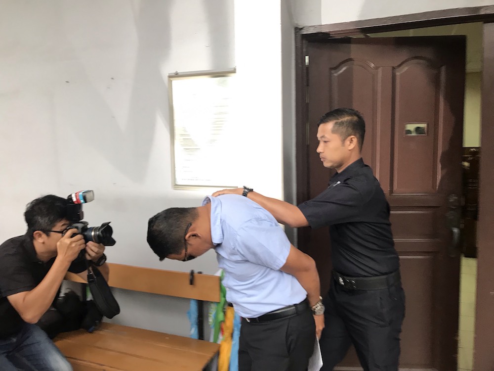 Abdul Munif Ali was charged with requesting and receiving bribes at the Session Court in Ipoh August 1, 2019. u00e2u20acu201d Picture by John Bunyan
