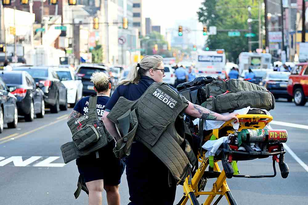 Police and medics respond to an active shooter situation, where Philadelphia police officers were shot during a drug raid on a home, in Philadelphia, Pennsylvania August 14, 2019. u00e2u20acu201d Reuters pic
