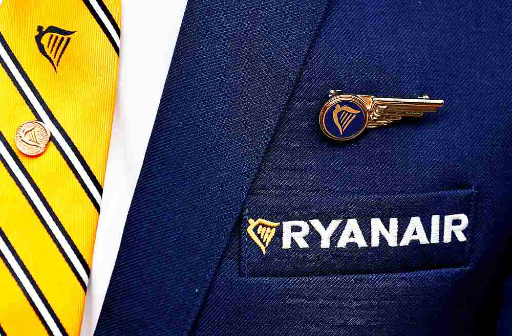 Ryanair logo is pictured on the the jacket of a cabin crew member ahead of a news conference by Ryanair union representatives in Brussels, Belgium September 13, 2018. u00e2u20acu201d Reuters pic