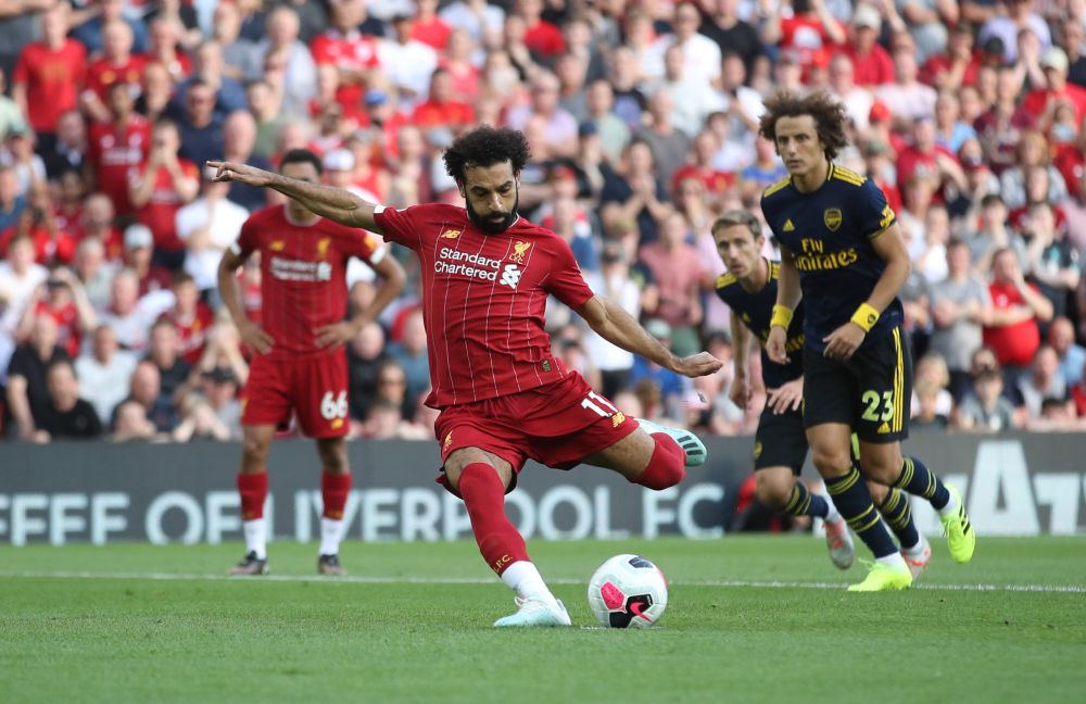 Liverpool's Mohamed Salah scores their second goal from the penalty spot against Arsenal.  u00e2u20acu201d Reuters pic