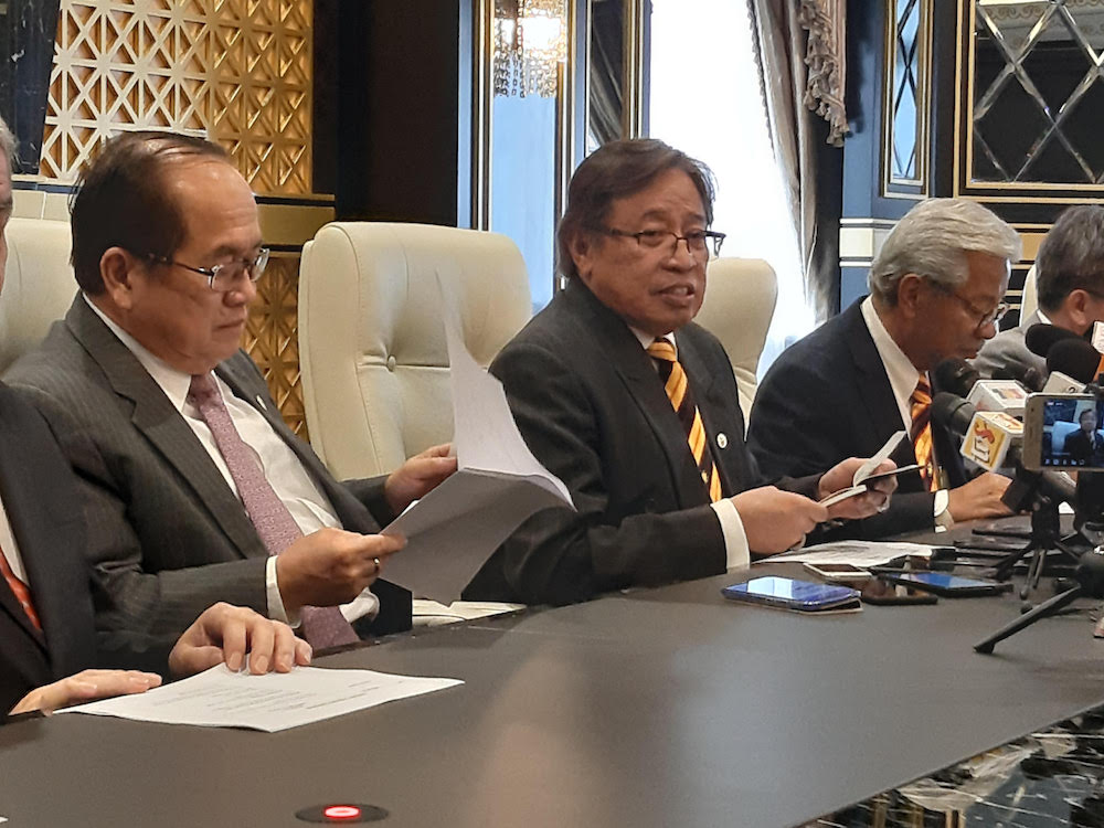 Chief Minister Datuk Patinggi Abang Johari Openg (centre) speaks to reporters after chairing a state Cabinet meeting in Kuching August 22, 2019. u00e2u20acu201d Picture by Sulok Tawie