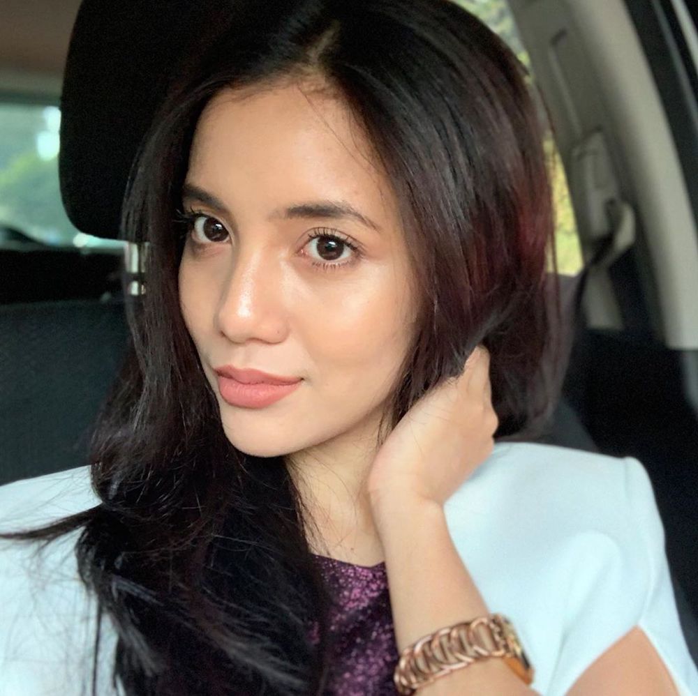 Social media users thought the u00e2u20acu02dcCinta Tiada Gantiu00e2u20acu2122 star used lip fillers because of her pouty poses in photographs. u00e2u20acu201c Picture from Instagram/Sweet Qismina