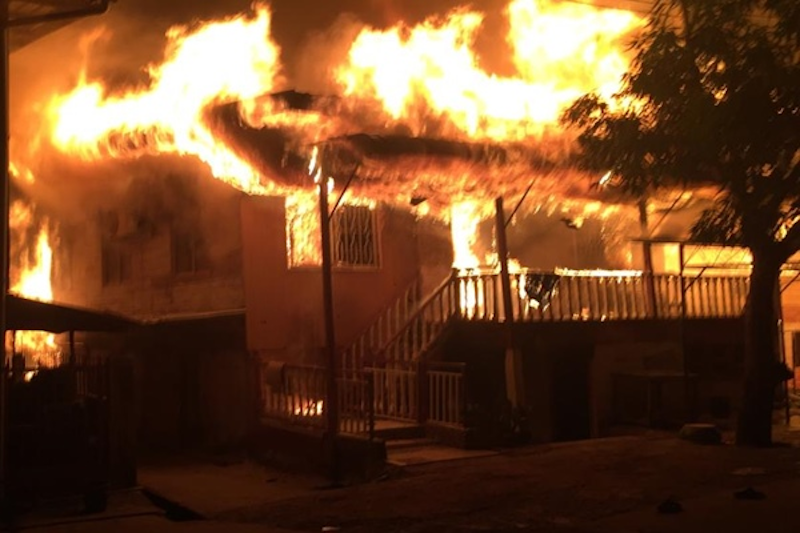 A house burns during a fire in Kampung Otentik, Tanjung Batu Keramat last night. u00e2u20acu201d Picture via Twitter/Bernamadotcom