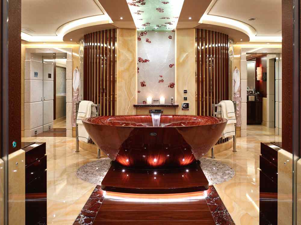 A free-standing bathtub is just one of the many opulent features available on board the master bathroom. — Picture courtesy of Camper & Nicholsons