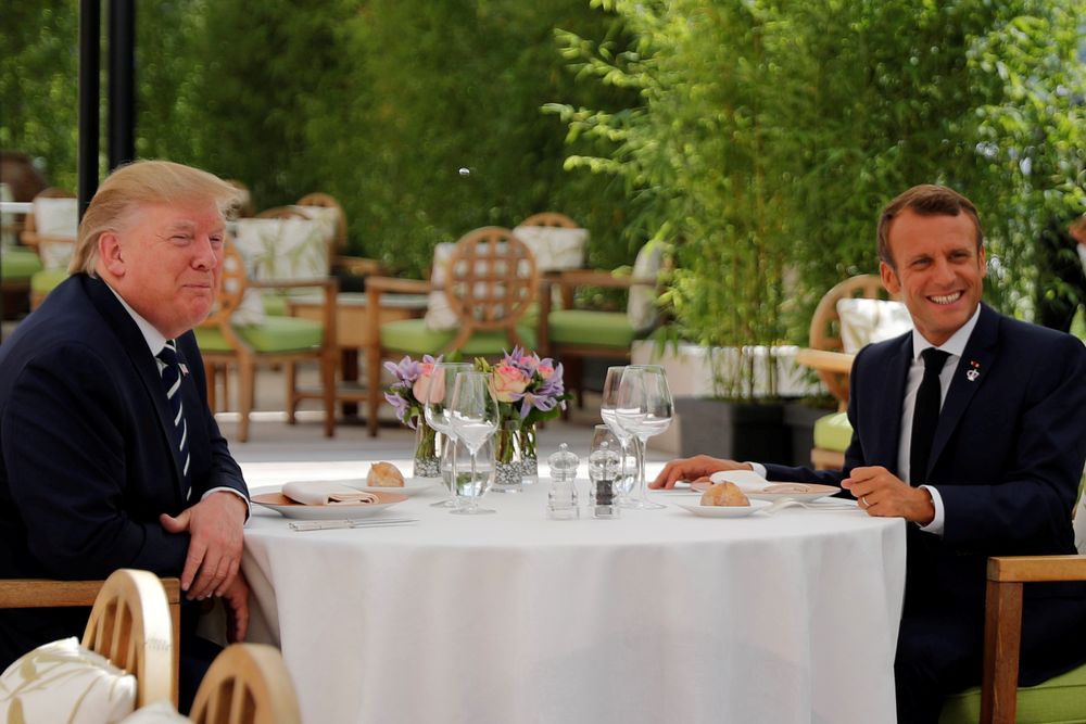 US President Donald Trump and French President Emmanuel Macron attend a lunch ahead of the G7 summit in Biarritz, France August 24, 2019. u00e2u20acu201d Reuters pic