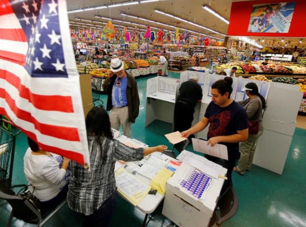 File picture shows people voting in the US presidential primary election at a polling station located in a grocery store in National City, California, United States, June 7, 2016. u00e2u20acu201d Reuters pic