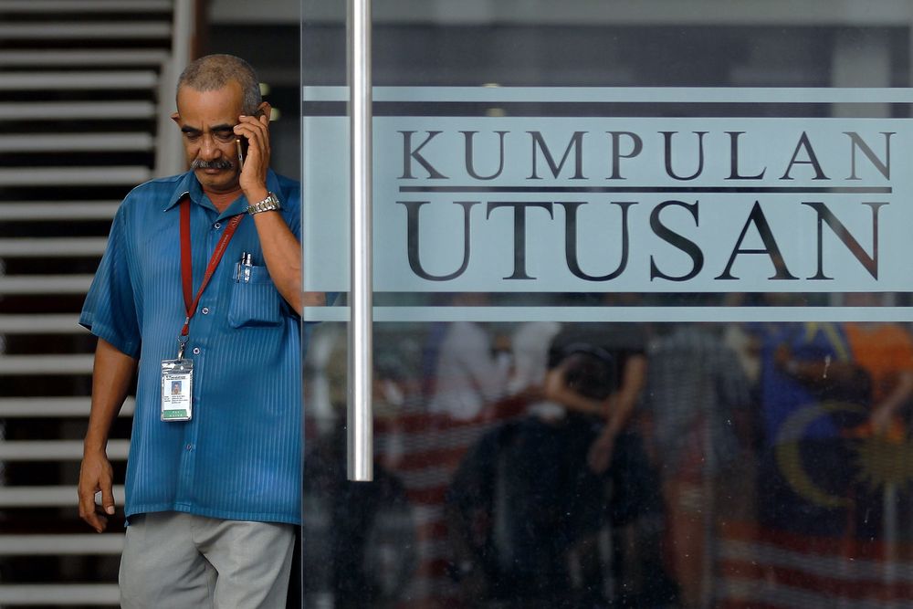 An employee leaving the Utusan Melayu (M) Berhad building in Kuala Lumpur, August 20, 2019. u00e2u20acu201d Bernama pic