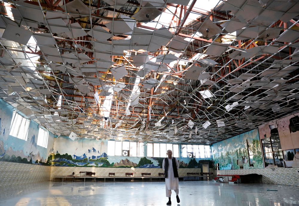 An Afghan man inspects a damaged wedding hall after a blast in Kabul, Afghanistan August 18, 2019. u00e2u20acu201d Reuters pic