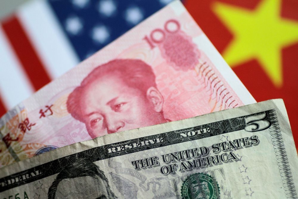 US dollar and Chinese yuan notes are seen in this picture illustration June 2, 2017. u00e2u20acu201d Reuters pic