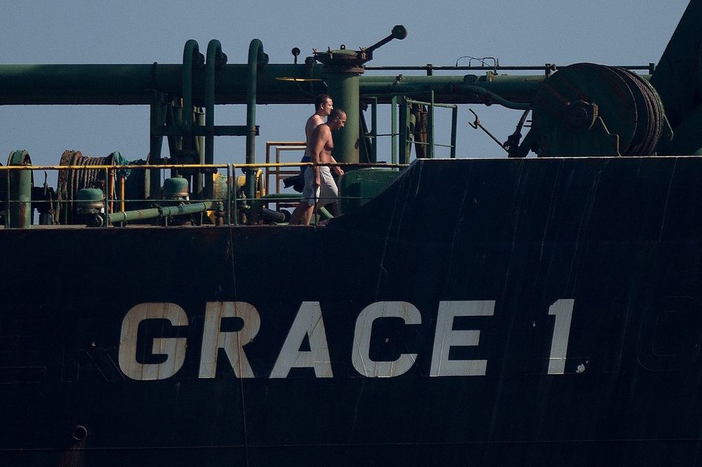 Crew members of Iranian supertanker Grace 1 walk on board off the coast of Gibraltar on August 15, 2019. u00e2u20acu201d AFP pic