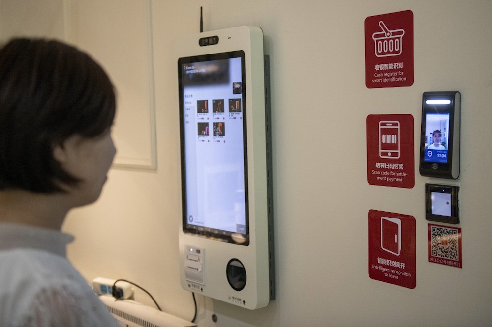 A woman uses a facial recognition device installed at an IFuree Go self-service supermarket in Tianjin August 21, 2019. u00e2u20acu201d AFP pic