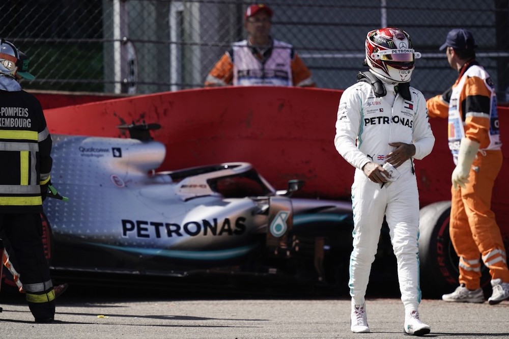 Mercedesu00e2u20acu2122 Lewis Hamilton walks next to his damaged car on the circuit after crashing into a wall during the third practice session at the Spa-Francorchamps circuit in Spa August 31, 2019 ahead of the Belgian Formula One Grand Prix. u00e2u20acu201d AFP pic
