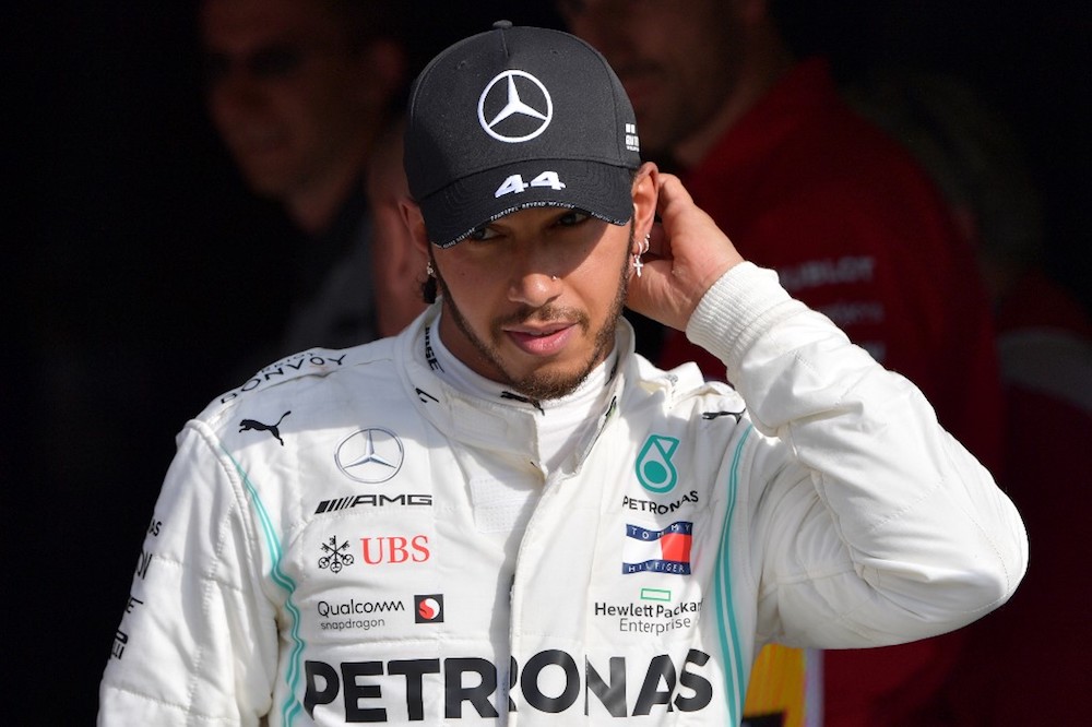 Third placed Mercedesu00e2u20acu2122 driver Lewis Hamilton arrives on the podium after the Italian Formula One Grand Prix at the Autodromo Nazionale circuit in Monza September 8, 2019. u00e2u20acu201d AFP pic