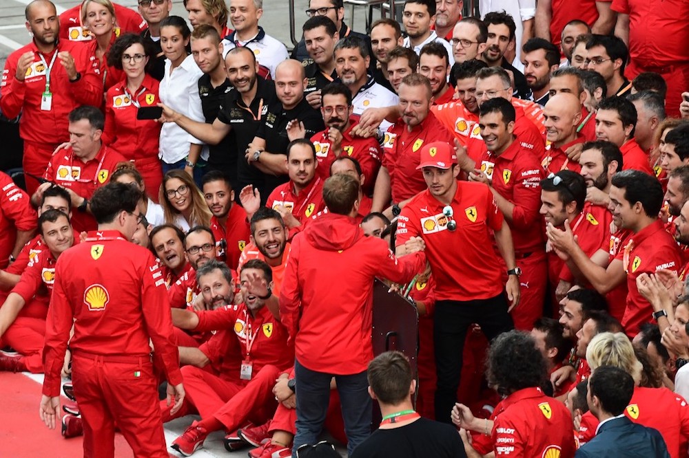 Winner Ferrariu00e2u20acu2122s Charles Leclerc is congratulated by Ferrariu00e2u20acu2122s Sebastian Vettel, next to Ferrari team principal Mattia Binotto and other Ferrari F1 team members as they celebrate after the Italian Formula One Grand Prix in Monza September 8, 2019. u00e2u20acu201d
