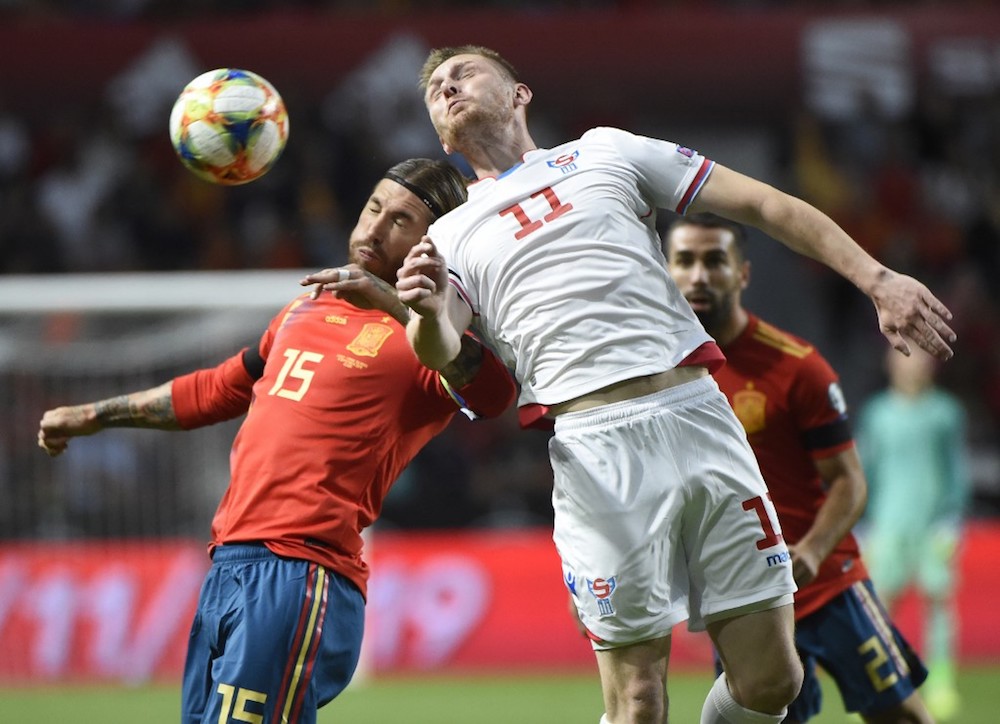 Spainu00e2u20acu2122s Sergio Ramos (left) vies with Faroe Islandsu00e2u20acu2122 forward Klaemint Olsen during the Uefa Euro 2020 qualifier group F match at El Molinon stadium in Gijon September 8, 2019. u00e2u20acu201d AFP pic