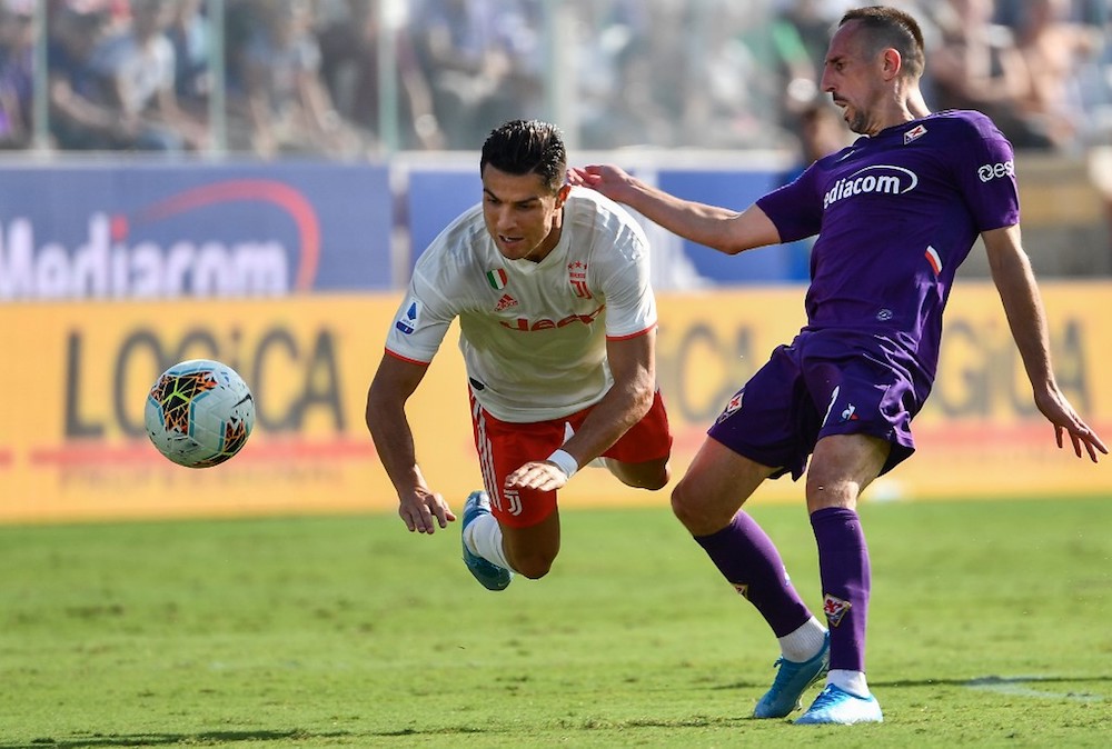 Fiorentinau00e2u20acu2122s Franck Ribery tackles Juventusu00e2u20acu2122 Cristiano Ronaldo during their Serie A match at the Artemio-Franchi stadium in Florence September 14, 2019. u00e2u20acu201d AFP pic