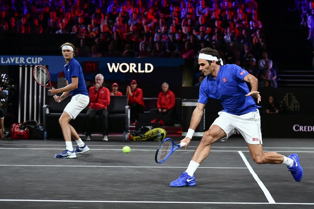 Team Europe's Roger Federer (right) returns a ball next to teammate Alexander Zverev during their double match against Team World's Denis Shapovalov and Jack Sock as part of the 2019 Laver Cup tennis tournament in Geneva September 20, 2019. u00e2u20acu201d AFP pic