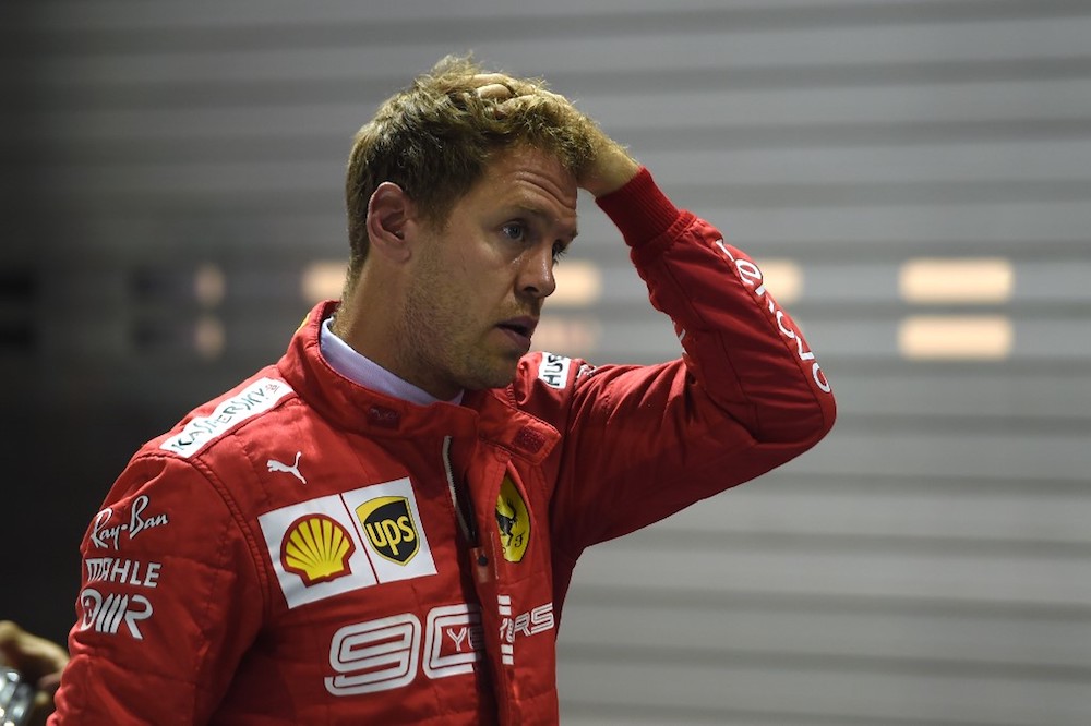 Ferrariu00e2u20acu2122s Sebastian Vettel reacts after finishing in the third pole position in the qualifying session for the Formula One Singapore Grand Prix September 21, 2019. u00e2u20acu201d AFP pic