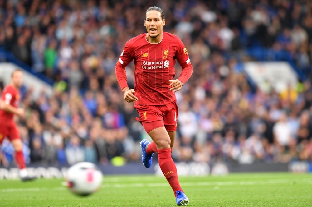 Liverpoolu00e2u20acu2122s Virgil van Dijk chases the ball during the English Premier League match with Arsenal at the Emirates Stadium in London September 22, 2019. u00e2u20acu201d AFP pic