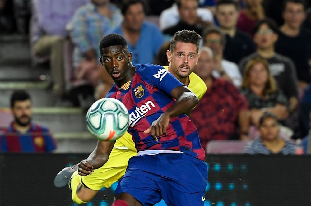 Barcelonau00e2u20acu2122s Ousmane Dembele vies with Villarrealu00e2u20acu2122s Xavi Quintilla during their La Liga match at the Camp Nou stadium in Barcelona September 24, 2019. u00e2u20acu201d AFP pic