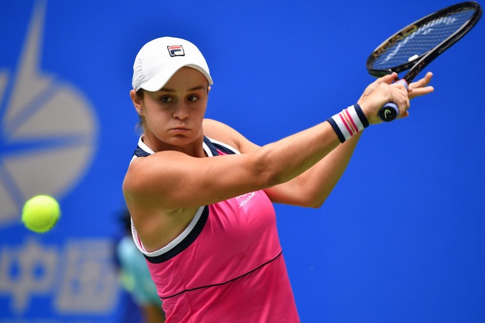 Ashleigh Barty of Australia hits a return against Sofia Kenin of the US during their third-round womenu00e2u20acu2122s singles match at the Wuhan Open in Wuhan September 25, 2019. u00e2u20acu201d AFP pic