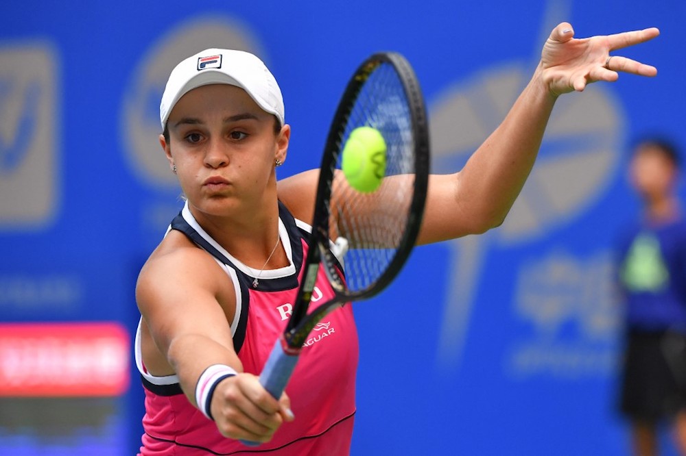 Ashleigh Barty of Australia hits a return against Petra Martic of Croatia during their womenu00e2u20acu2122s singles quarter-final match at the Wuhan Open in Wuhan September 26, 2019. u00e2u20acu201d AFP pic