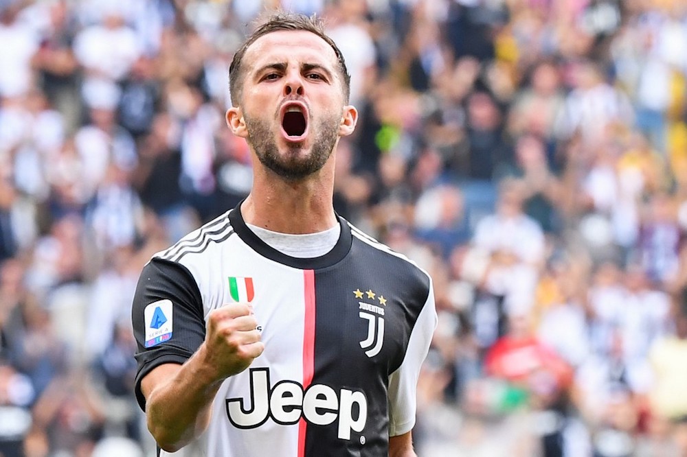 Juventusu00e2u20acu2122 Miralem Pjanic celebrates after opening the scoring during the Italian Serie A match with Spal at the Juventus stadium in Turin September 28, 2019. u00e2u20acu201d AFP pic