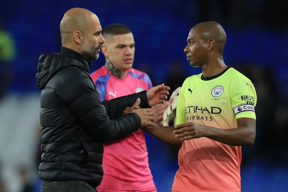 Manchester Cityu00e2u20acu2122s manager Pep Guardiola gestures with Fernandinho at the final whistle during the English Premier League match with Everton at Goodison Park in Liverpool September 28, 2019. u00e2u20acu201d AFP pic
