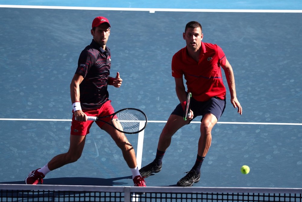 Serbiau00e2u20acu2122s Novak Djokovic and Filip Krajinovic play against Croatiau00e2u20acu2122s Mate Pavic and Brazilu00e2u20acu2122s Bruno Soares in their menu00e2u20acu2122s doubles round of 16 match at the ATP Japan Open in Tokyo September 30, 2019. u00e2u20acu201d AFP pic