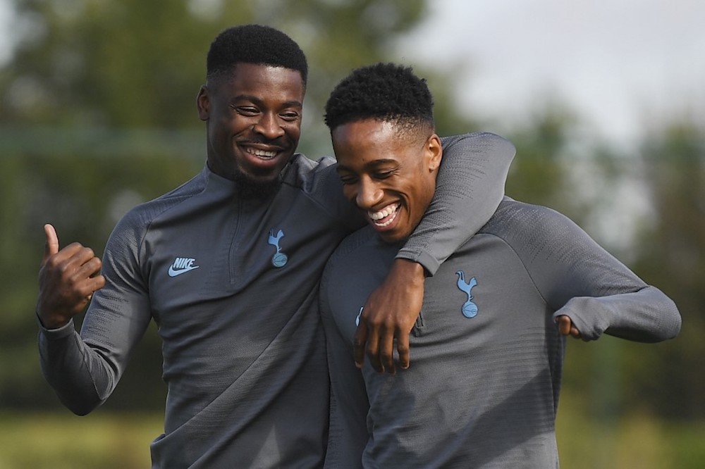 Tottenham Hotspuru00e2u20acu2122s Serge Aurier jokes with Kyle Walker-Peters during a team training session at Tottenham Hotspuru00e2u20acu2122s Enfield Training Centre, in north London September 30, 2019. u00e2u20acu201d AFP pic