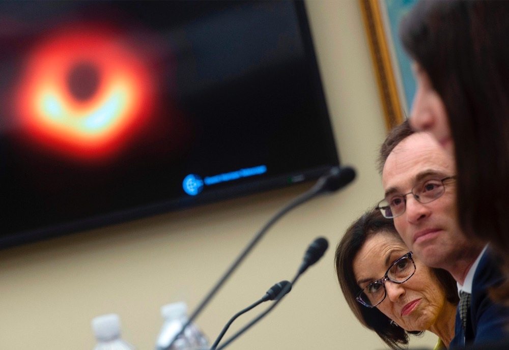 (from left) France Cordova and Shepherd Doeleman look on as American computer scientist Katherine Bouman speaks on the u00e2u20acu02dcEvent Horizon Telescope: The Black hole seen Round the Worldu00e2u20acu2122 in Washington, DC May 16, 2019. u00e2u20acu201d AFP pic