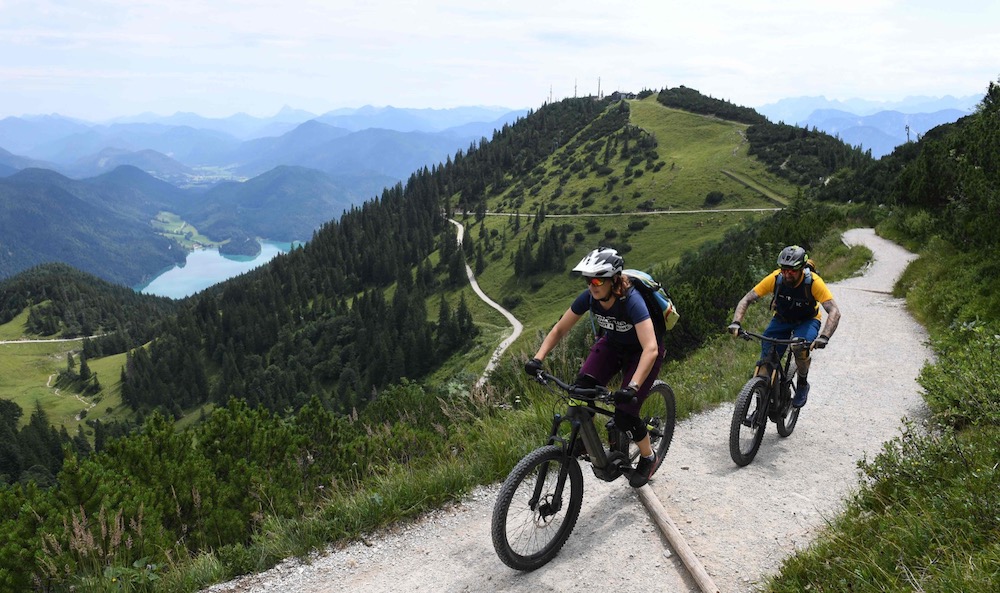 This file photo taken on August 5, 2019 shows Ursula and Robert Werner cycling on their electric bikes as they are on their way up to the Herzogstand mountain in the Alp mountains near the village Walchensee, southern Germany. u00e2u20acu201d AFP pic