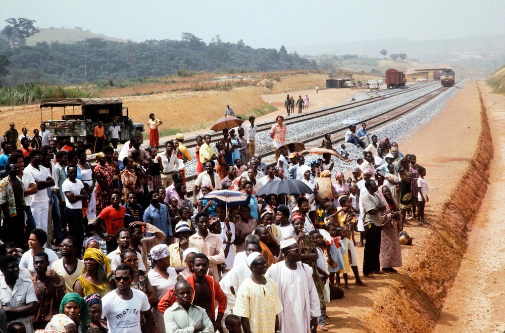 In this file photo taken on January 18, 1983 Gabonese take part to the inauguration of second section Ndjolu00c3u00a9-Boouu00c3u00a9the Trans-Gabon Railway (Transgabonais) in Gabon. u00e2u20acu201d AFP pic