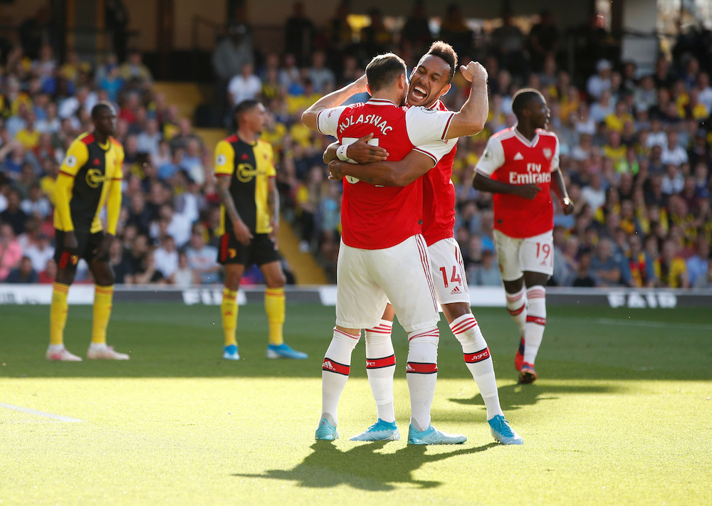 Arsenal's Pierre-Emerick Aubameyang celebrates scoring their first goal with Sead Kolasinac at Watford September 15, 2019. u00e2u20acu201d Action Images via Reuters/John Sibley 