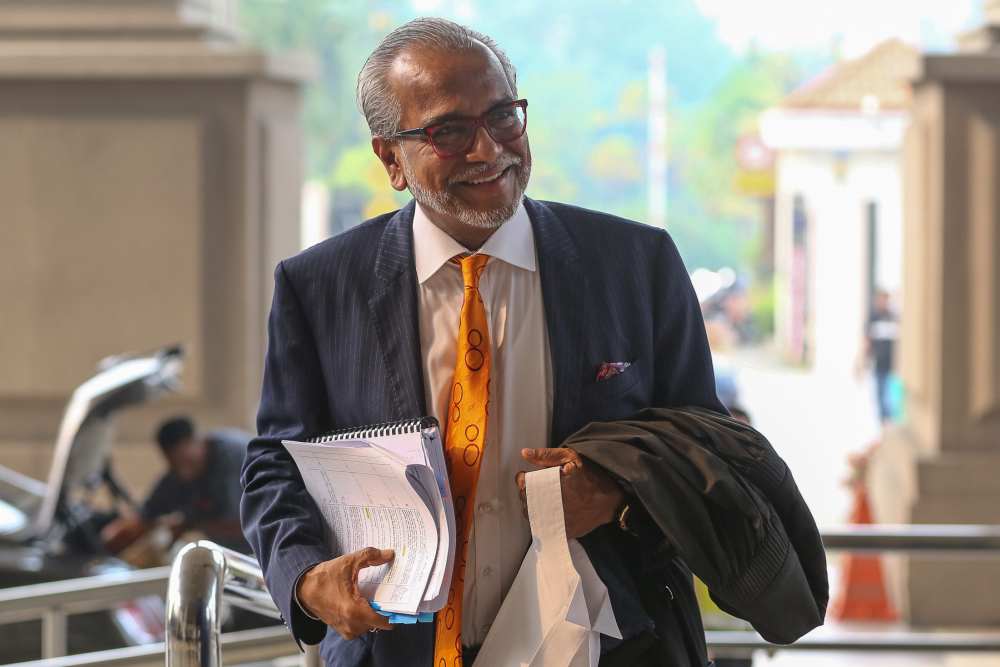 Lawyer Tan Sri Muhammad Shafee Abdullah arrives at the Kuala Lumpur High Court Complex, September 10, 2019. u00e2u20acu2022 Picture by Yusof Mat Isa
