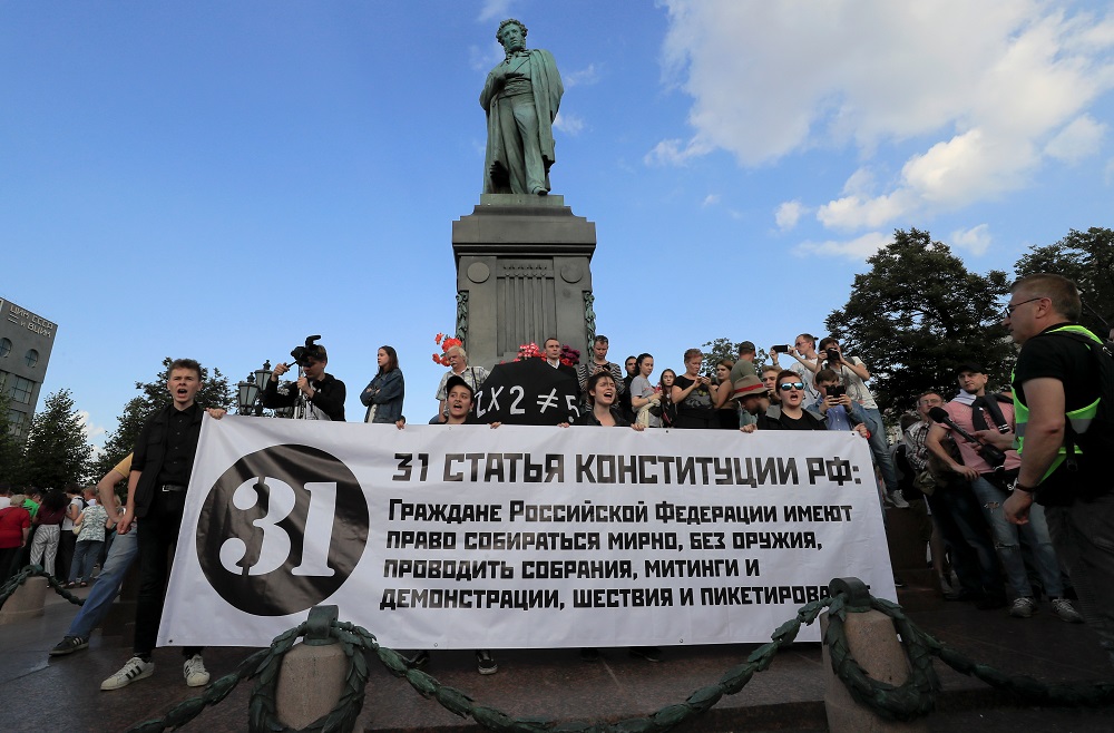 Participants stretch out a banner in support of Article 31 of the Russian constitution near the monument to Russian poet Alexander Pushkin in Moscow August 31, 2019. u00e2u20acu201d Reuters pic