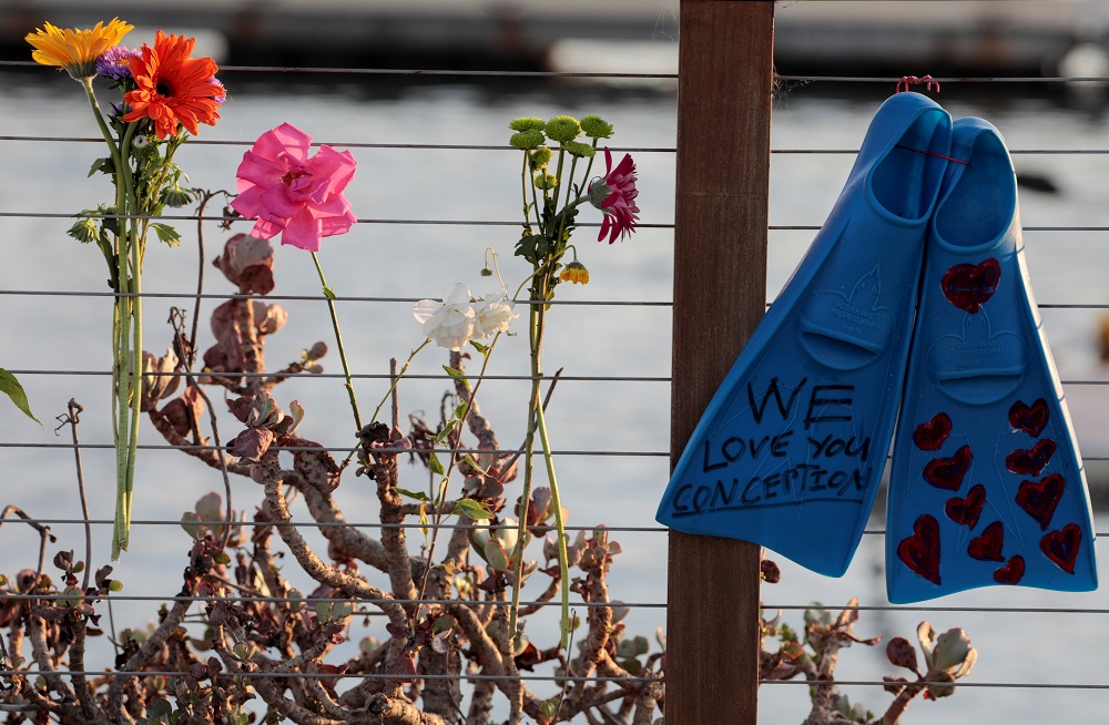 Flowers are seen at a makeshift memorial near Truth Aquatics after a pre-dawn fire sank a commercial diving boat off a Southern California island near Santa Barbara September 2, 2019. u00e2u20acu201d Reuters pic