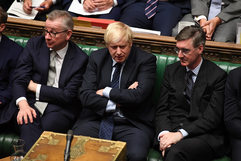 Britainu00e2u20acu2122s Prime Minister Boris Johnson, Chancellor of the Duchy of Lancaster Michael Gove (left), and leader of the House of Commons Jacob Rees-Mogg (right) attend in the House of Commons in London September 3, 2019. u00e2u20acu201d Picture by UK Parliament/Jessica