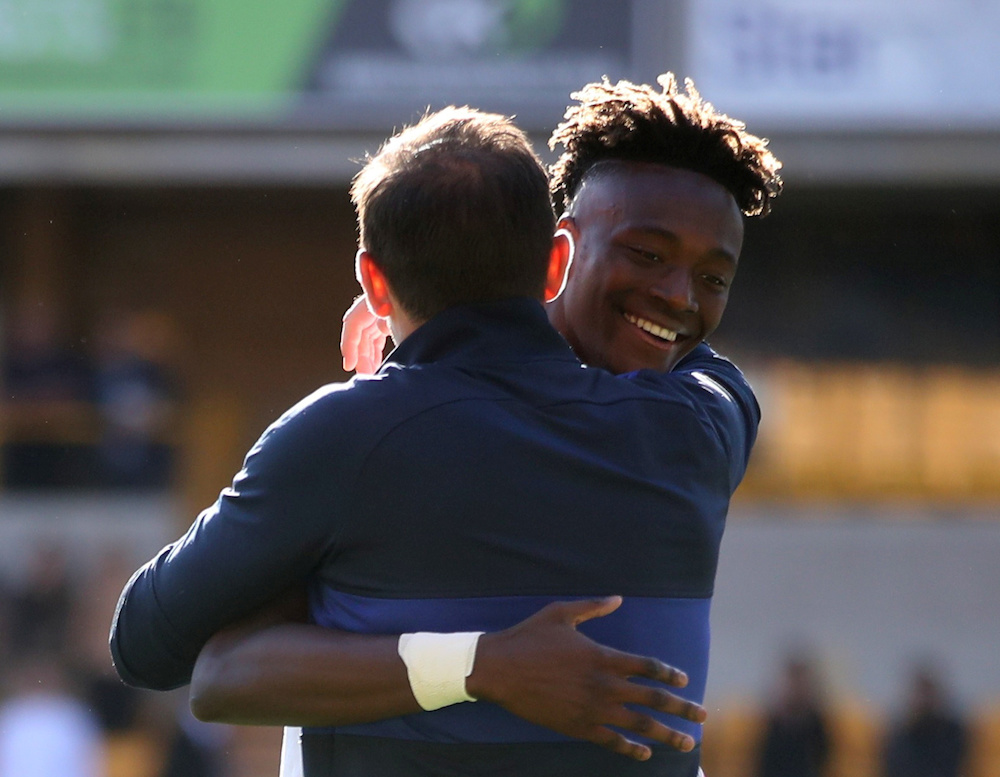 Chelseau00e2u20acu2122s Tammy Abraham celebrates with manager Frank Lampard after the Premier League match with Wolverhampton Wanderers at Molineux Stadium in Wolverhampton September 14, 2019. u00e2u20acu201d Action Images pic via Reuters