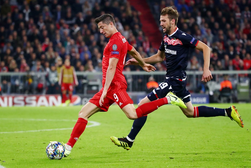 Bayern Munichu00e2u20acu2122s Robert Lewandowski in action with Crvena Zvezdau00e2u20acu2122s Nemanja Milunovic at the Allianz Arena in Munich September 18, 2019. u00e2u20acu201d Reuters pic