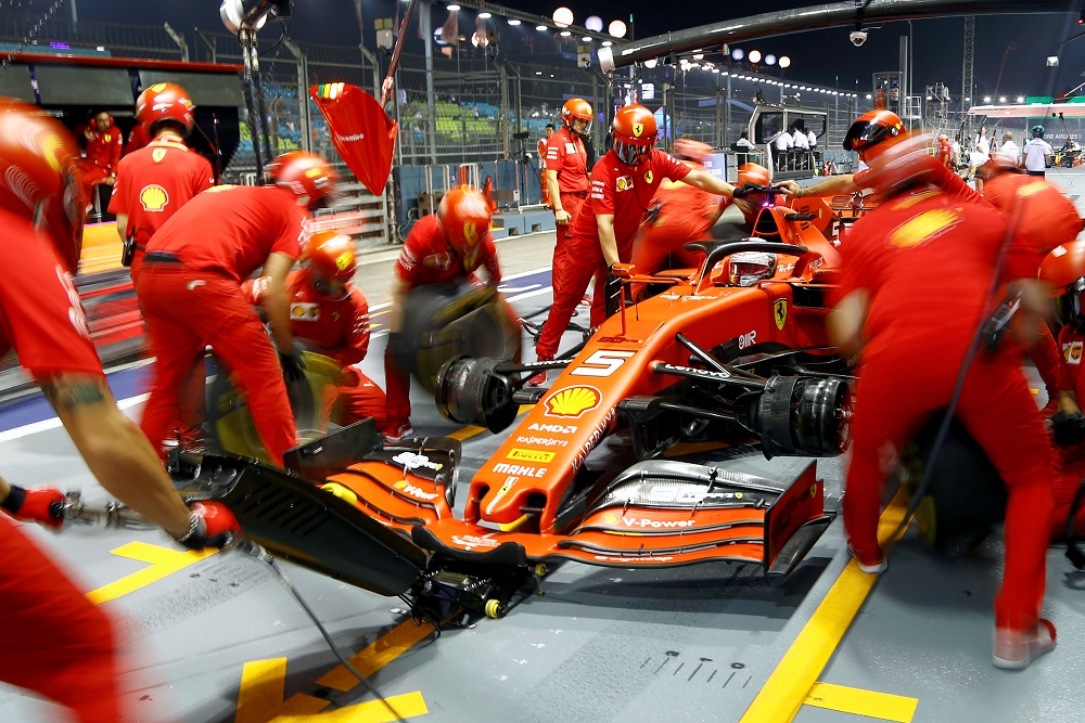 Ferrari's Sebastian Vettel and mechanics during practice at the Marina Bay Street Circuit in Singapore September 20, 2019. u00e2u20acu201d Reuters pic