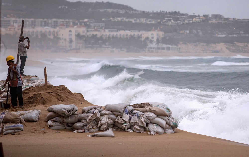 Workers are pictured at La Medano beach in Cabo San Lucas as Hurricane Lorena churns close to the southern tip of Mexico's Baja California peninsula September 20, 2019. u00e2u20acu201d Reuters pic