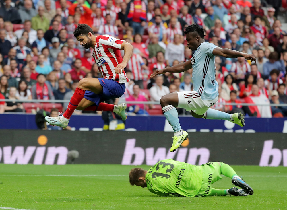 Atletico Madridu00e2u20acu2122s Diego Costa in action with Celta Vigou00e2u20acu2122s Ruben Blanco and Joseph Aidoo during their La Liga match at Wanda Metropolitano in Madrid September 21, 2019. u00e2u20acu201d Reuters pic