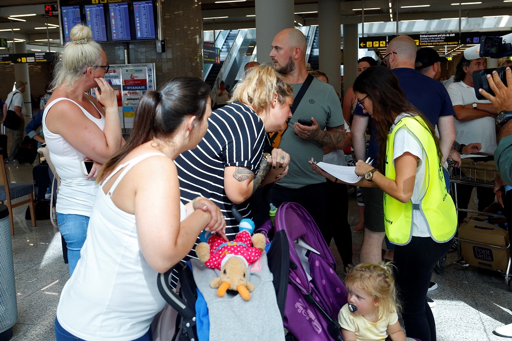 Passengers are seen at Mallorca Airport after Thomas Cook collapsed stranding hundreds of thousands of holidaymakers around the globe September 23, 2019. u00e2u20acu201d Reuters pic