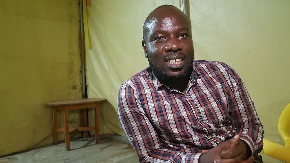Albert Nabonibo, 35, sits in a restaurant in Kigali, Rwanda September 17, 2019. u00e2u20acu201d  Thomson Reuters Foundation