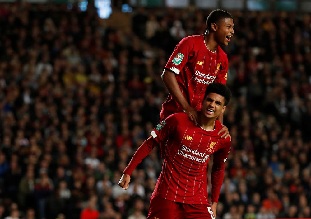 Liverpoolu00e2u20acu2122s Ki-Jana Hoever celebrates scoring their second goal with Rhian Brewster during their Carabao Cup third-round match with MK Dons at Stadium MK in Milton Keynes September 25, 2019. u00e2u20acu201d Reuters pic