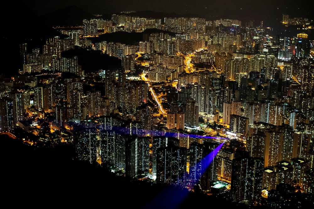 Laser beams, coming from the residential buildings in Kowloon district, are seen as anti-government protesters gather at Lion Rock, in Hong Kong September 13, 2019. u00e2u20acu201d Reuters pic