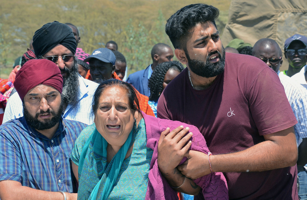 People mourn as Kenya Red Cross workers and volunteers retrieve the bodies of their relatives who died in flash floods while on an excursion at the Hell's Gate National Park in Naivasha, Kenya September 2, 2019. u00e2u20acu201du00c2u00a0Reuters pic