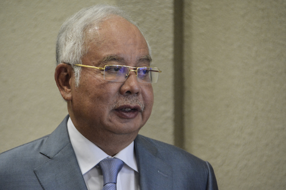 Datuk Seri Najib Razak arrives for his 1MDB trial at the Kuala Lumpur High Court September 4, 2019. — Picture by Miera Zulyana