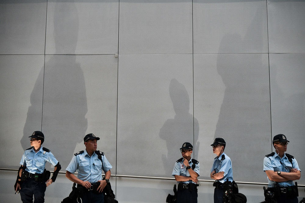 Police stand guard at the international airport in Hong Kong September 1, 2019. u00e2u20acu201d AFP pic